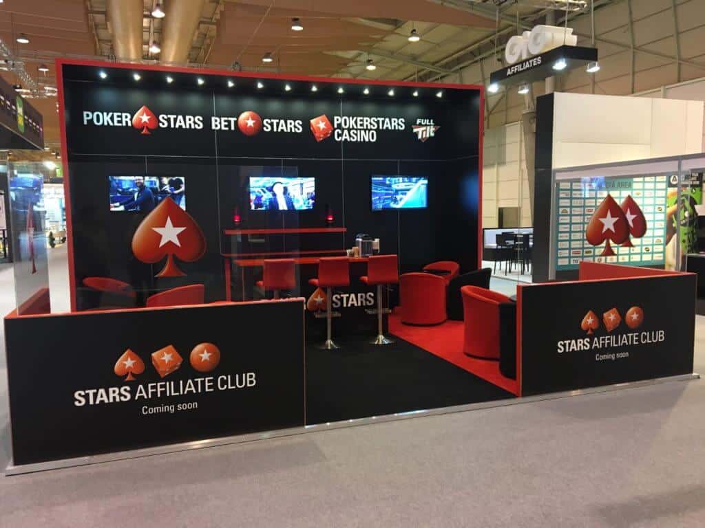 Poker Stars black and red exhibition stand with wall mounted screens